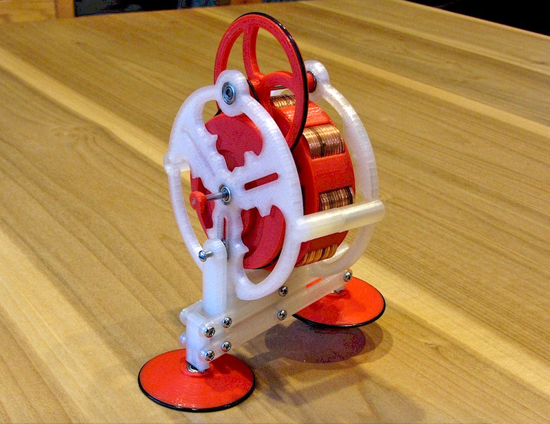 Illustration for article titled Got Loose Change? 104 Pennies Help This Simple 3D-Printed Toy Walk